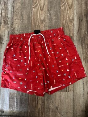Helly Hansen Red Swim Shorts with Nautical Flag Print